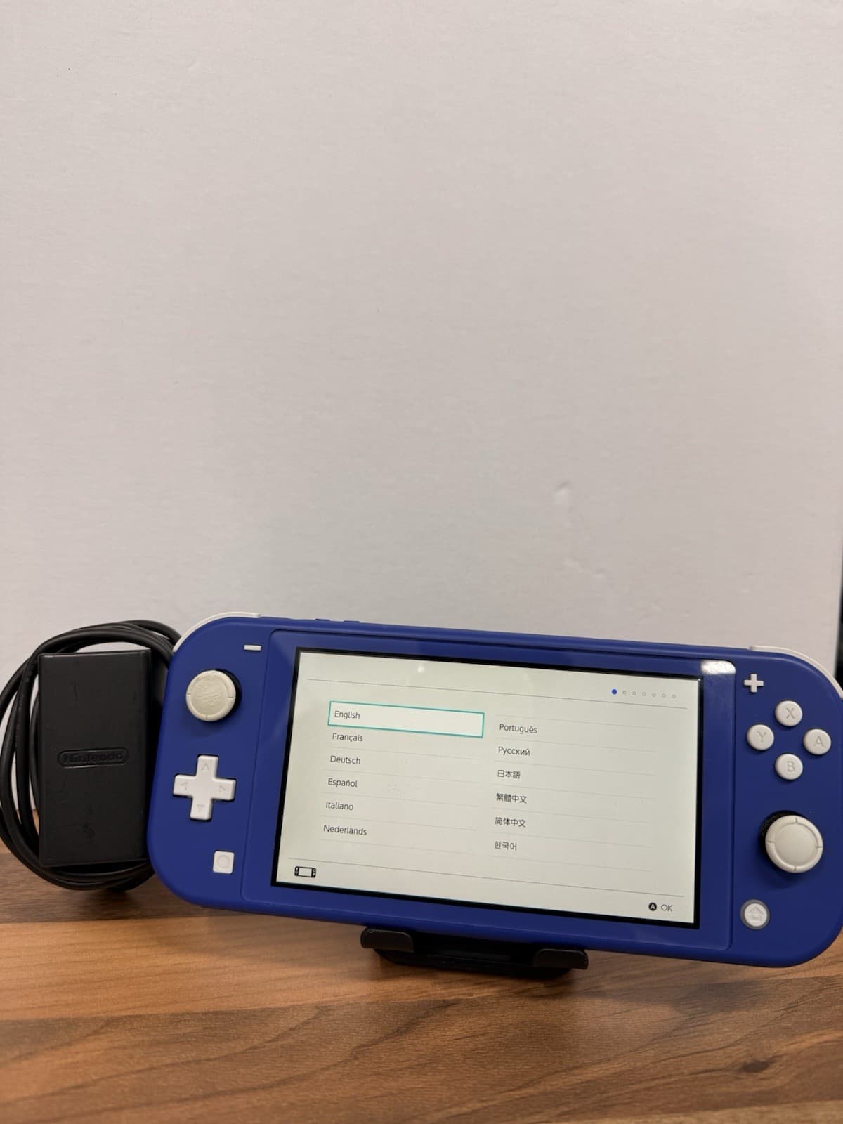 Switch Lite, Unboxed, Blue With Charger, Small Dent On Stick, grade Good